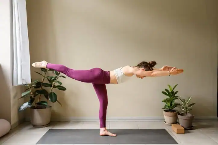 Achieving the Perfect Tone: How Often Should You Exercise for Results? 1 Woman doing Yoga exercise Burgess Hill to help with toning the body.